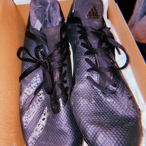 Adidas size 10 women’s predator soccer cleats.